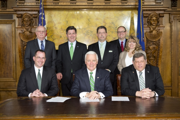 PSAB staff with former Gov. Tom Corbett signing a bill into law
